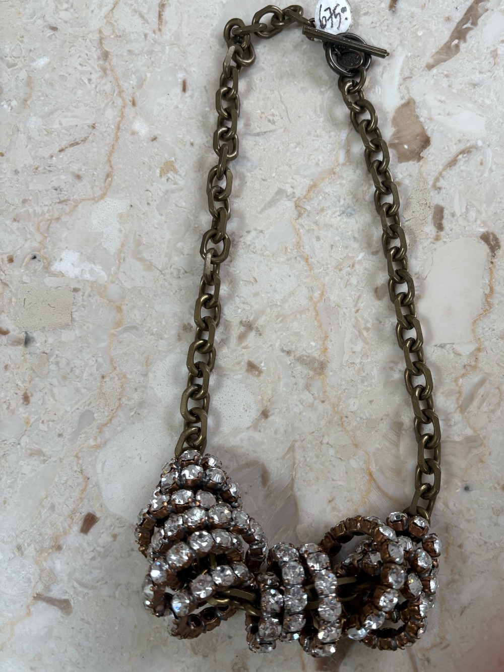 Crystal Bow Pendant Necklace in Bronze Tone